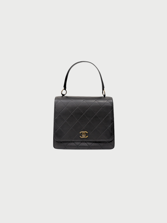 Chanel 1990s Black Leather Matelassé Turn-Lock Handbag