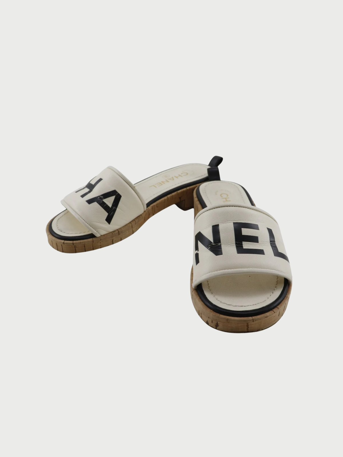 Chanel 2000s White Black Leather Cork Logo Mules