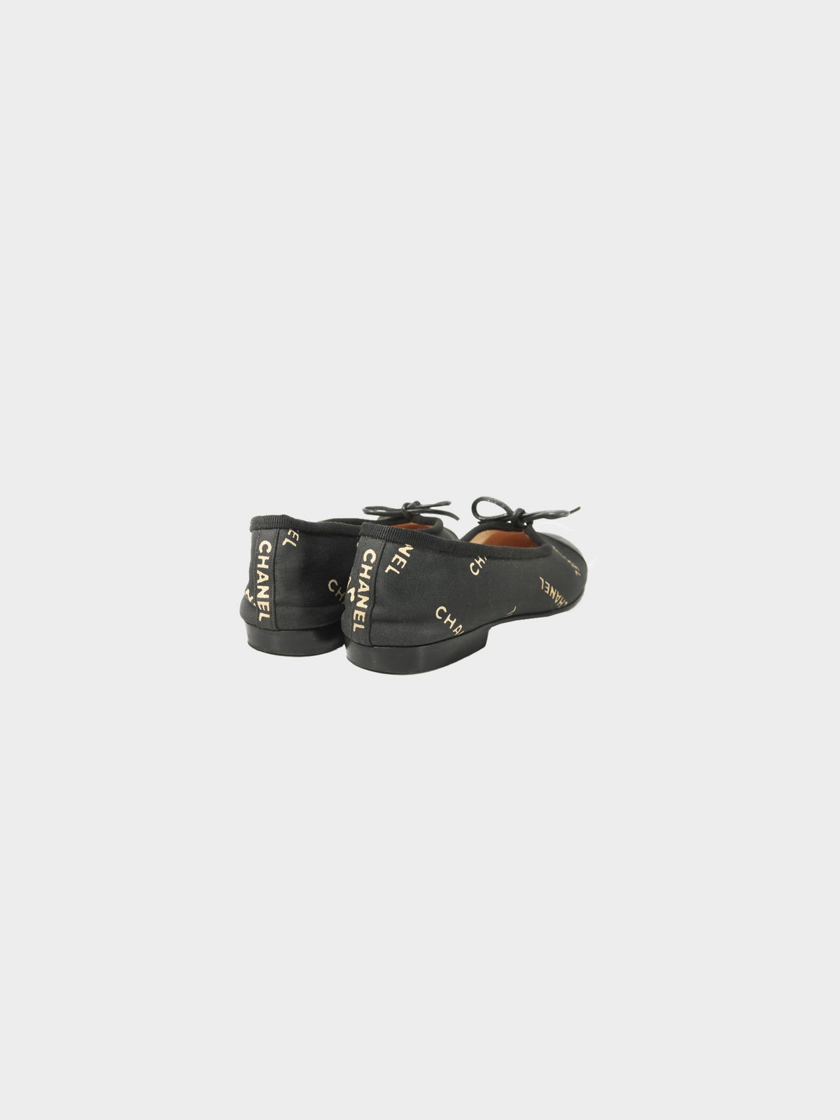 Chanel 2000s Black Canvas and Leather Logo Print Ballet Flats