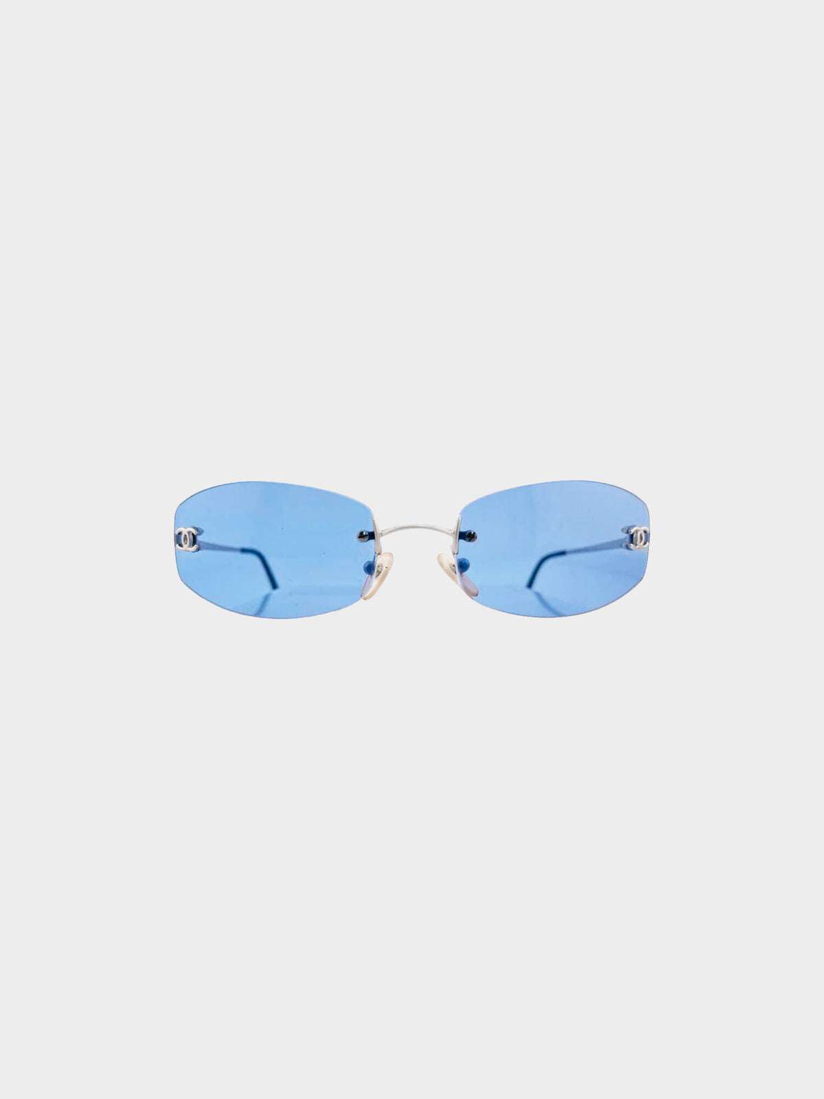 Chanel by Karl Lagerfeld 2000s Blue Tinted CC Logo Embellished Rimless Sunglasses