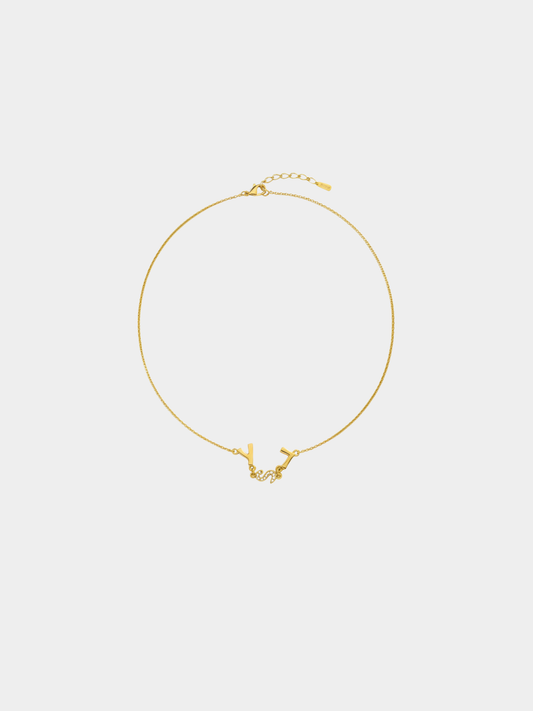 Yves Saint Laurent 2000s Gold Logo Rhinestone Necklace