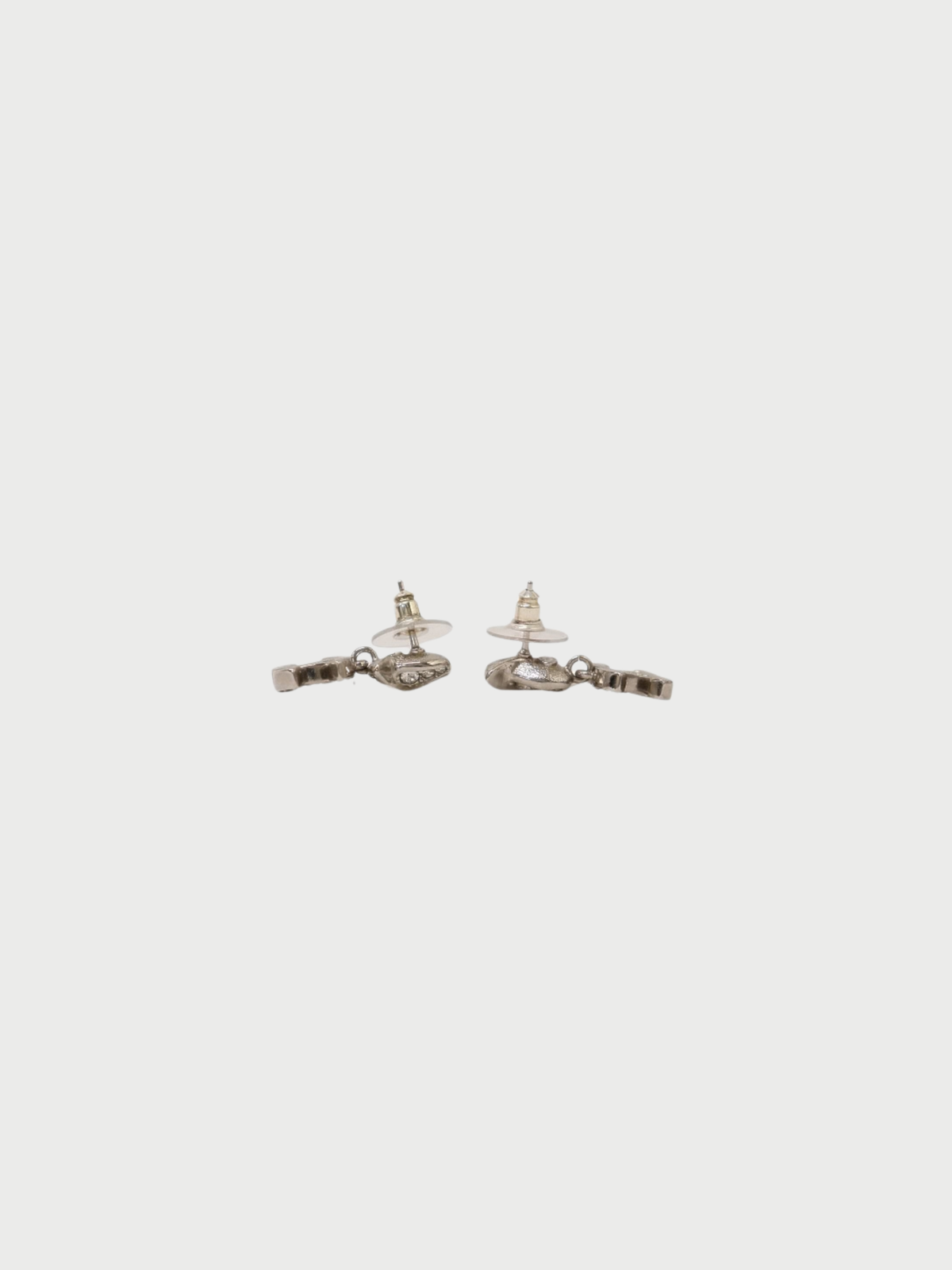 Chanel 2025 Silver Plated Metal COCO Rhinestone Swing Earrings