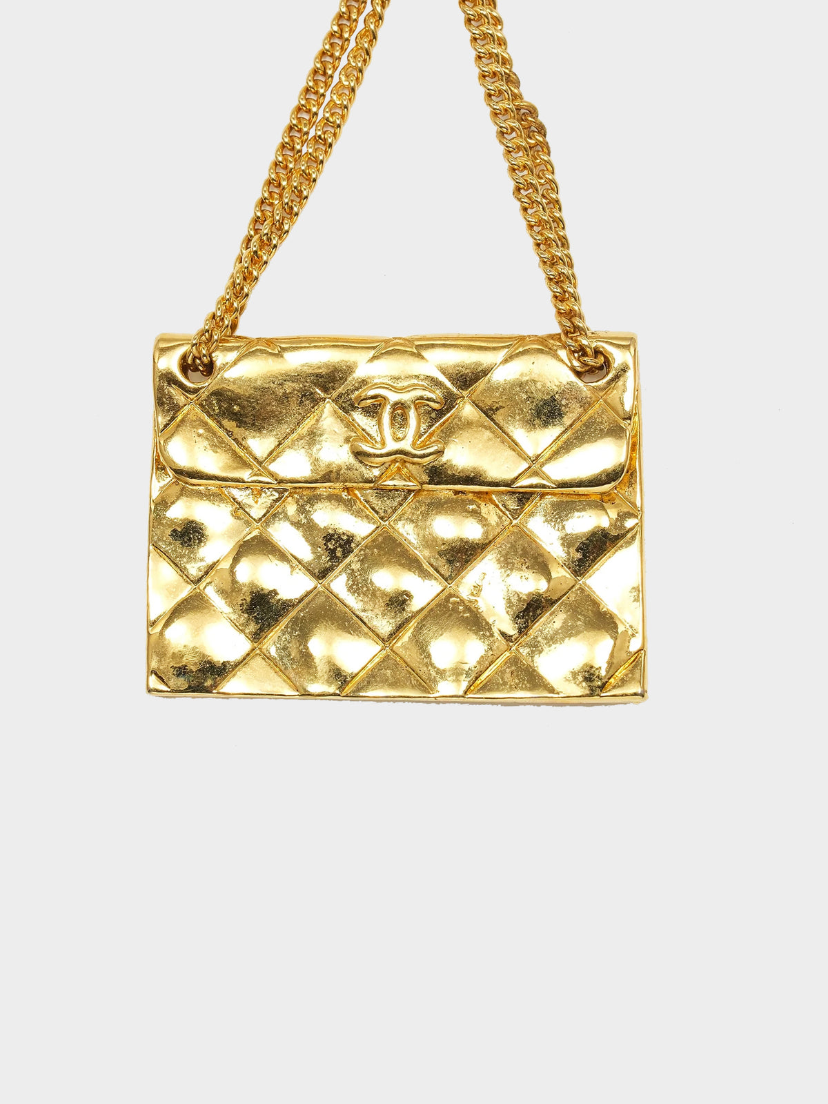 Chanel 1990s Gold CC Coin and Quilted Flap Brooch