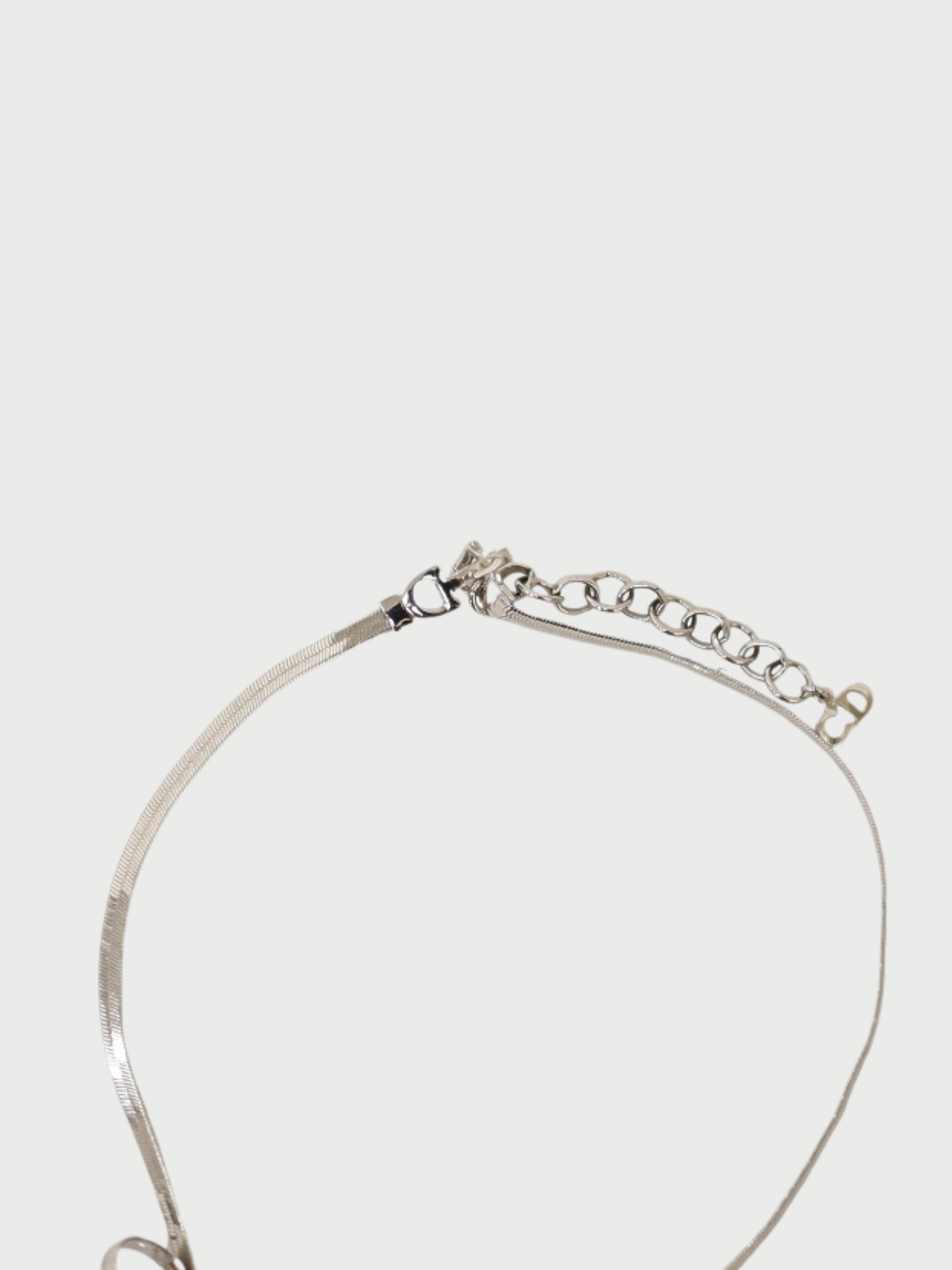 Christian Dior 2000s Silver Plated Metal CD Ribbon Necklace