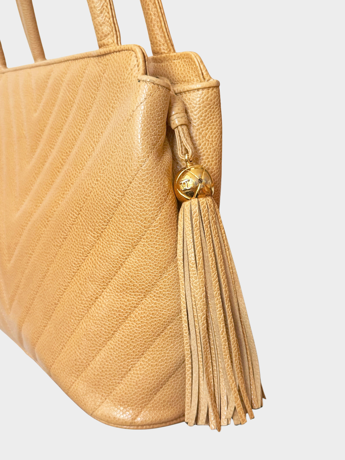 Chanel Early 1991-1994 Beige Caviar Leather Chevron Stitch Tassel Handbag