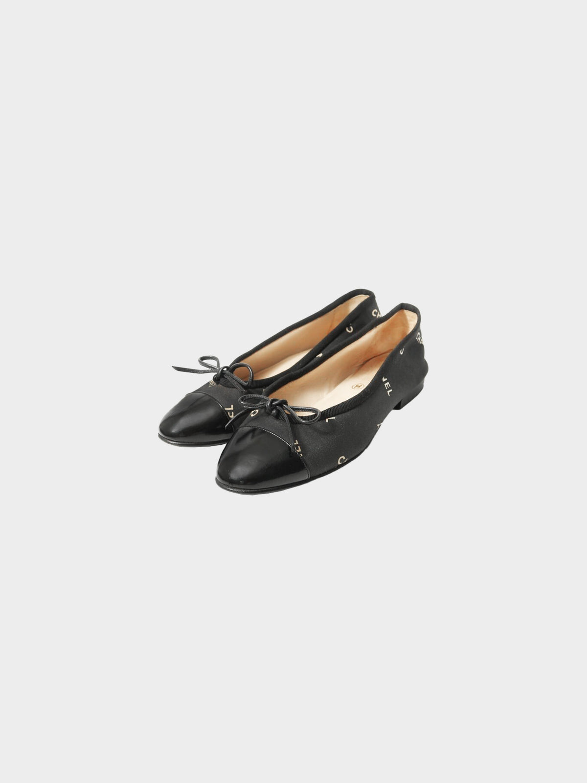 Chanel 2000s Black Canvas and Leather Logo Print Ballet Flats