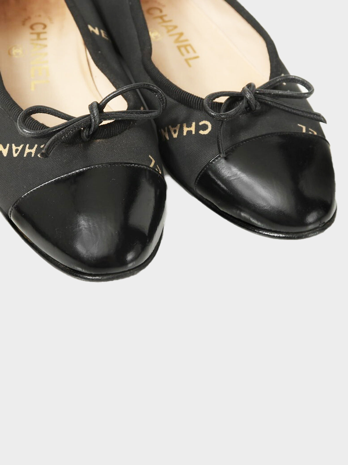 Chanel 2000s Black Canvas and Leather Logo Print Ballet Flats